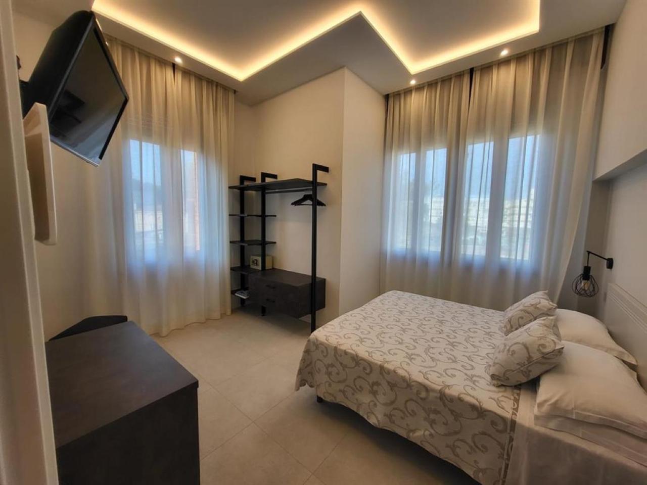 Camera Familiare con Bagno in Comune